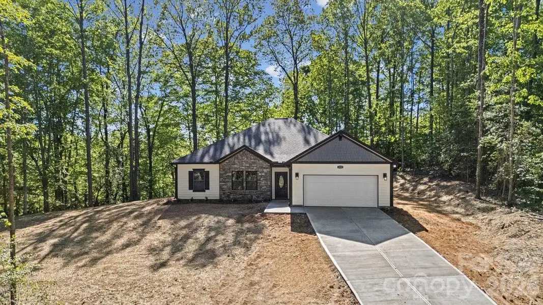 Front exterior of a new home in , Dallas, NC, highlighting curb appeal (Image 21).
