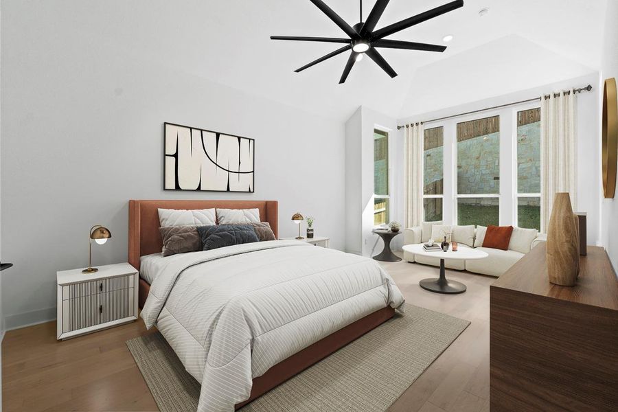 Bedroom with wood finished floors, a ceiling fan, and recessed lighting Bedroom with wood finished floors, a ceiling fan, and recessed lighting