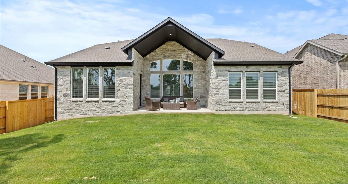 Exterior details and patio area of a home in 6 Creeks, Kyle (Image 4).