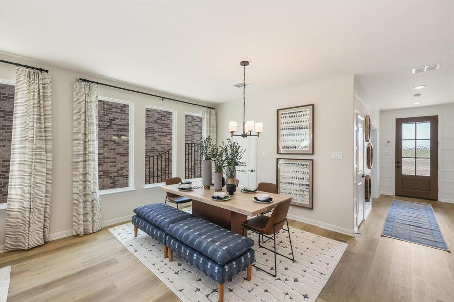 Adjacent to the kitchen, this lovely dining area is the perfect place for cozy family meals or fun dinner parties! Adjacent to the kitchen, this lovely dining area is the perfect place for cozy family meals or fun dinner parties!