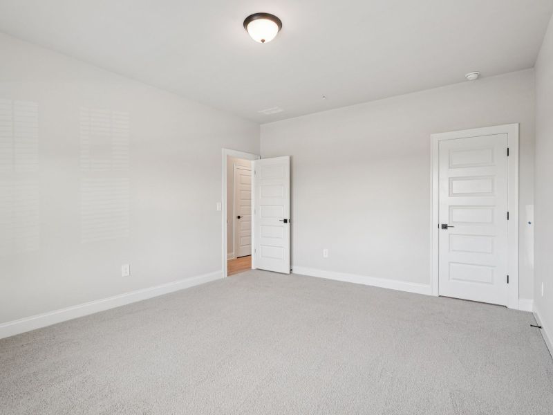 Spacious, unfurnished interior of a new home in Hemingway - Highland Series, Cumming (Image 15).