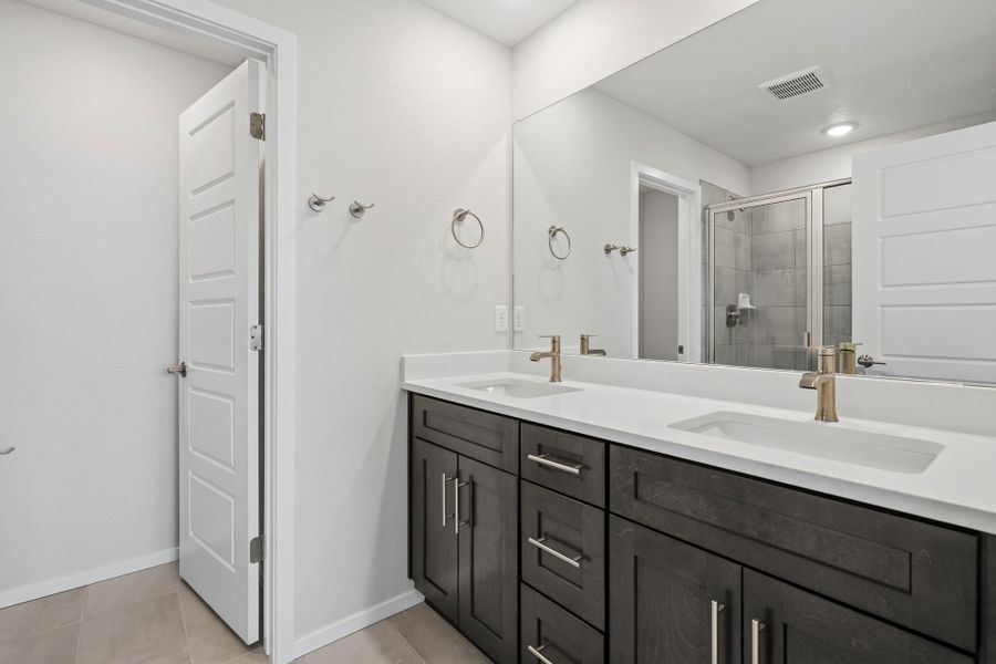 Furnished interior view inside a new home in Barefoot Village, Firestone (Image 11).