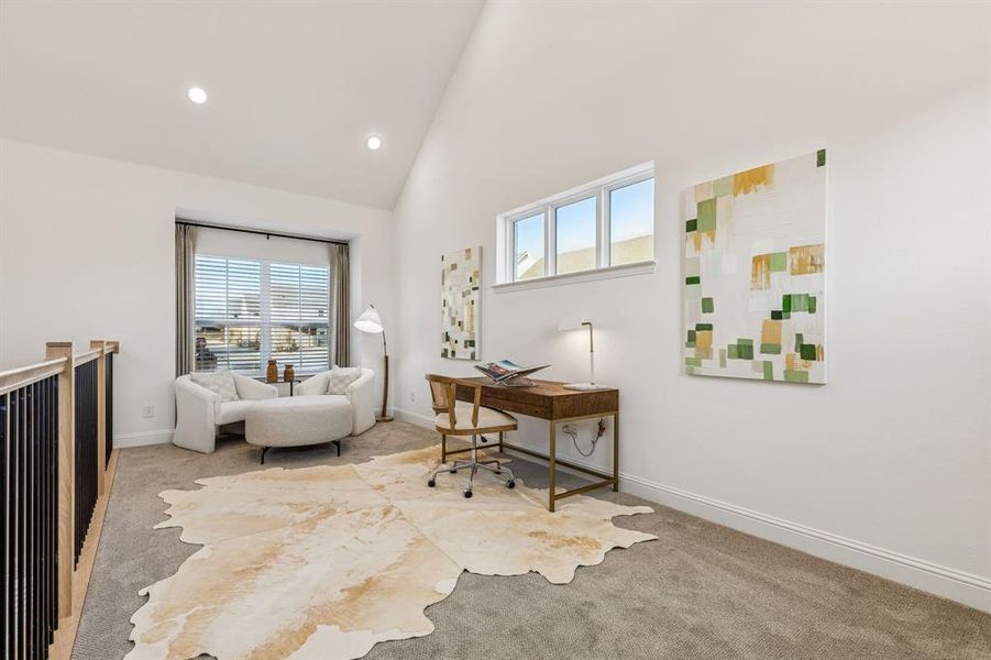 Office area with light carpet, recessed lighting, and vaulted ceiling