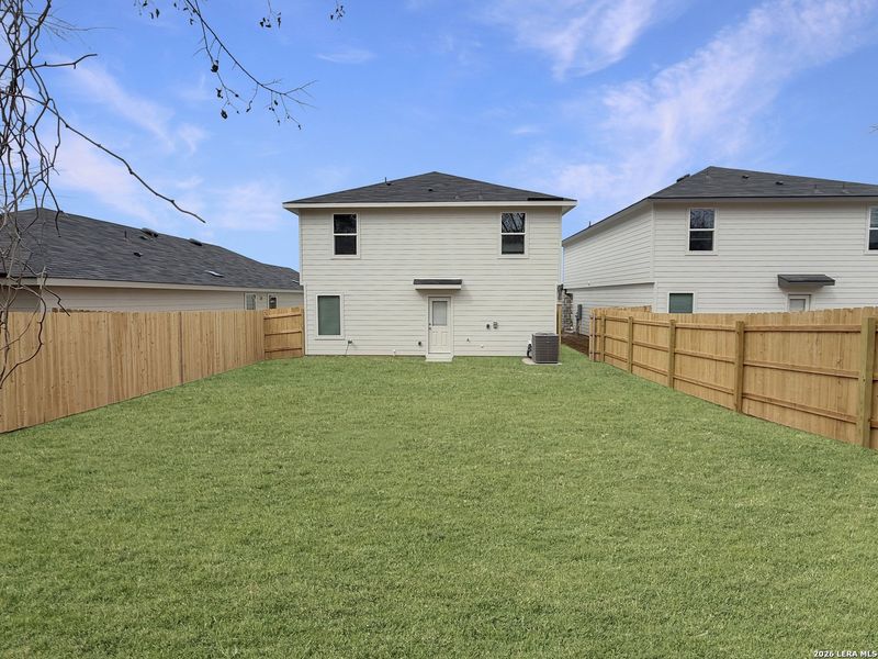 Exterior details and patio area of a home in Spring Valley, New Braunfels (Image 3).