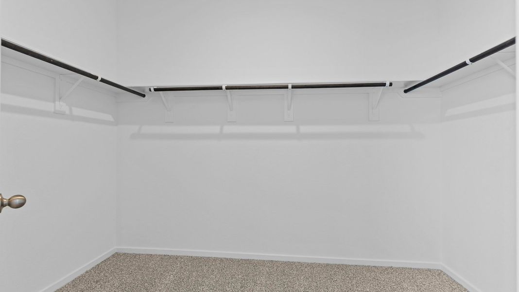 Representative unfurnished interior of a home built from the Hanna by D.R. Horton in Caldwell Crossing, Iowa Colony (Image 16).