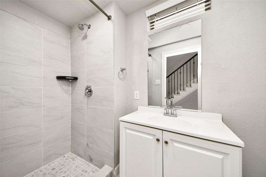 Additional bedroom with bright windows, soft neutral tones, and a comfortable move-in-ready layout.