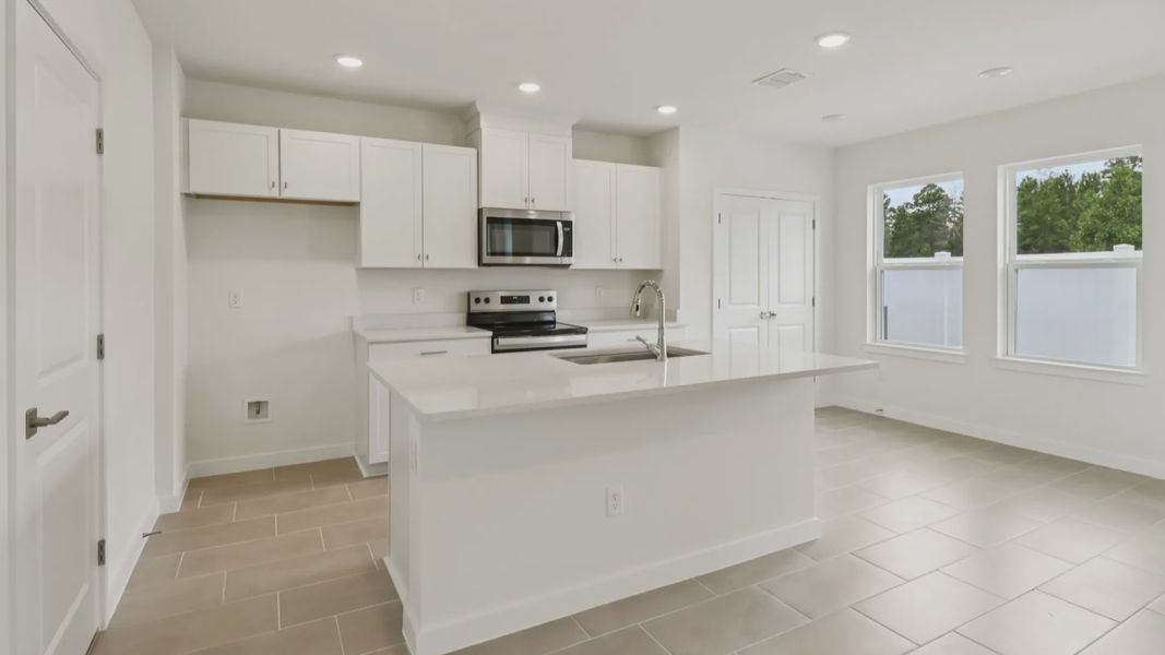 Furnished interior view inside a new home in Cyrene at Harmony, St. Cloud (Image 10).