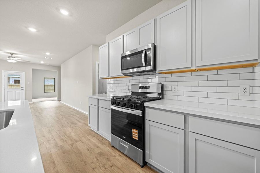 Furnished interior view inside a new home in Windrose Green, Angleton (Image 10).