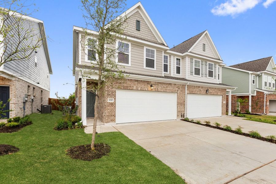 Front exterior of a new home in Lake Park Villas, Wylie, TX, highlighting curb appeal (Image 24).