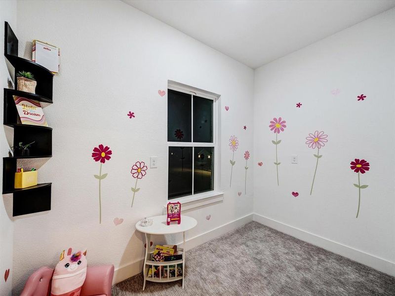 Rec room with carpet floors and baseboards Rec room with carpet floors and baseboards