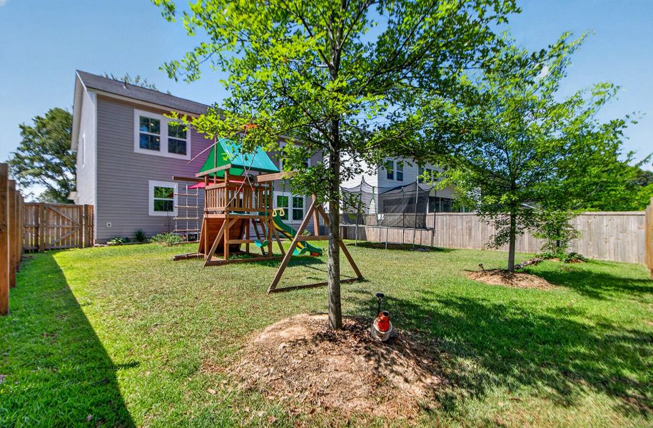 Exterior details and patio area of a home in Limehouse Village: Arbor Series, Summerville (Image 26). Exterior details and patio area of a home in Limehouse Village: Arbor Series, Summerville (Image 26).