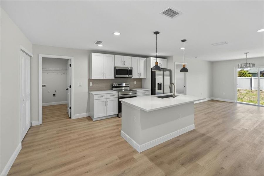 Furnished interior view inside a new home in , Port Charlotte (Image 9).
