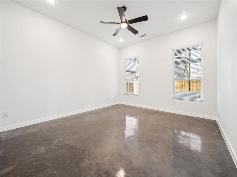 Empty room featuring ceiling fan