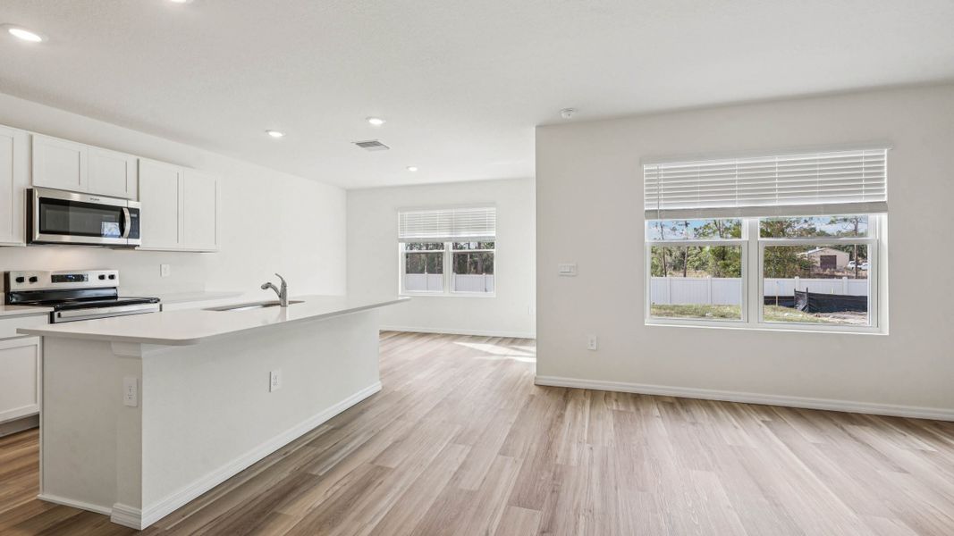 Representative furnished interior of a home built from the Darwin by D.R. Horton in Ocala Crossings South, Ocala (Image 14).
