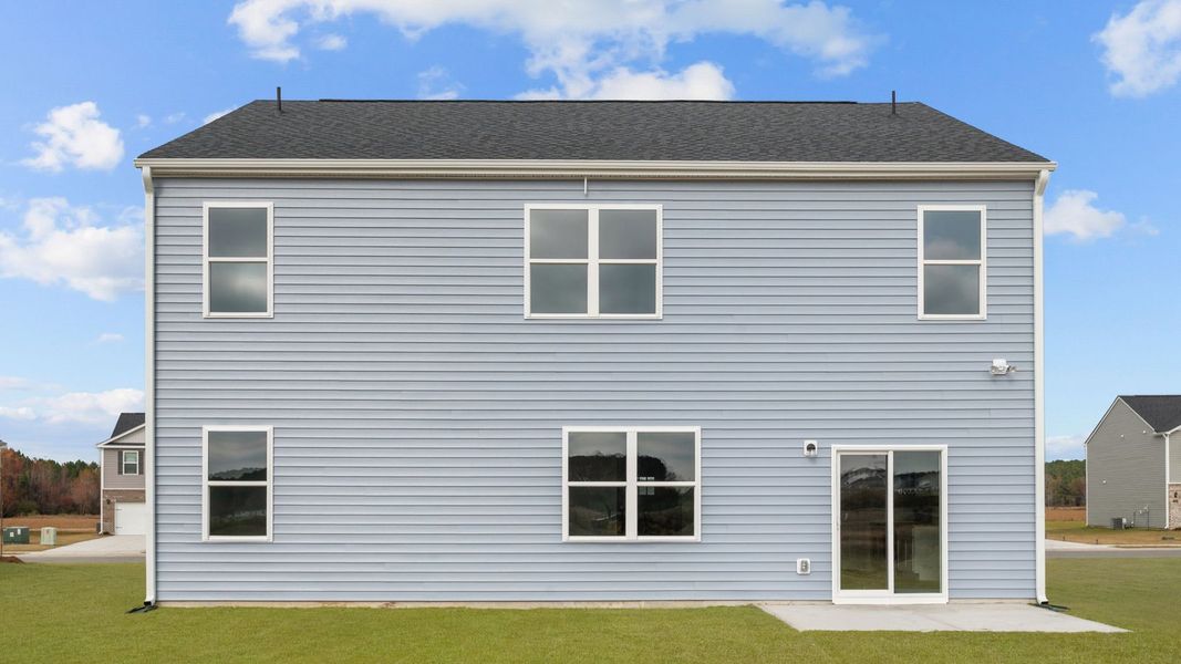 Exterior details and patio area of a home in East Ridge, Ayden (Image 21).