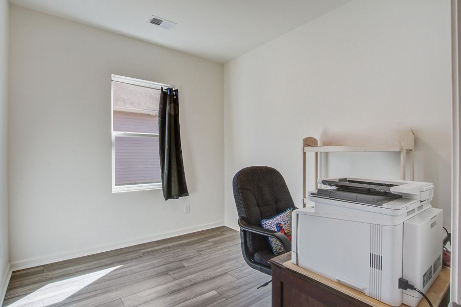 Furnished interior view inside a new home in Pender Woods at Cane Bay, Summerville (Image 9).