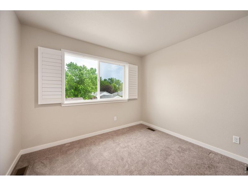 Spacious, unfurnished interior of a new home in Fickel Farm, Berthoud (Image 23).