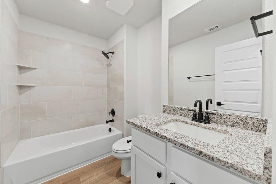 Furnished interior view inside a new home in Whisper Valley, Manor (Image 10).