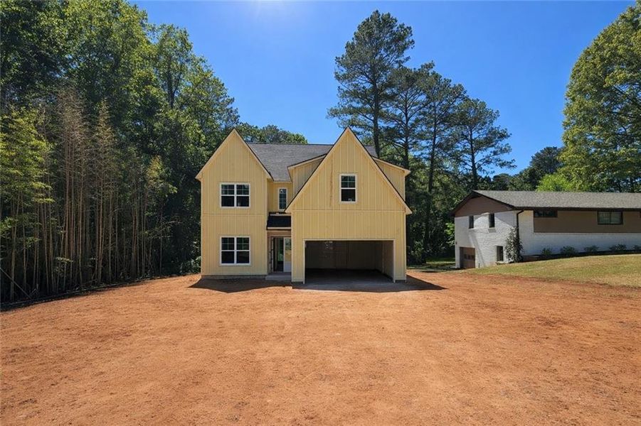 Front exterior of a new home in , Marietta, GA, highlighting curb appeal (Image 27).