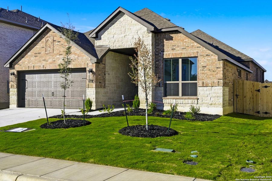 Front exterior of a new home in Haby Hill 50s, San Antonio, TX, highlighting curb appeal (Image 2). Front exterior of a new home in Haby Hill 50s, San Antonio, TX, highlighting curb appeal (Image 2).