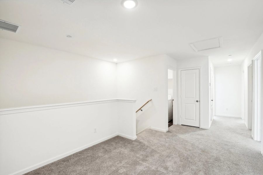 Representative unfurnished interior of a home built from the Glory by Starlight Homes in Broadmoor Village, Cedar Hill (Image 16).