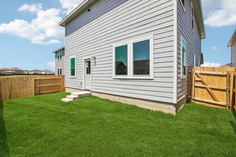 Exterior details and patio area of a home in Edgebrooke, Pflugerville (Image 16).