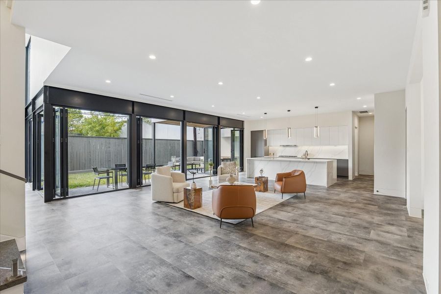 Seamless indoor-outdoor living with this open kitchen connecting to both the living area and outdoor space.