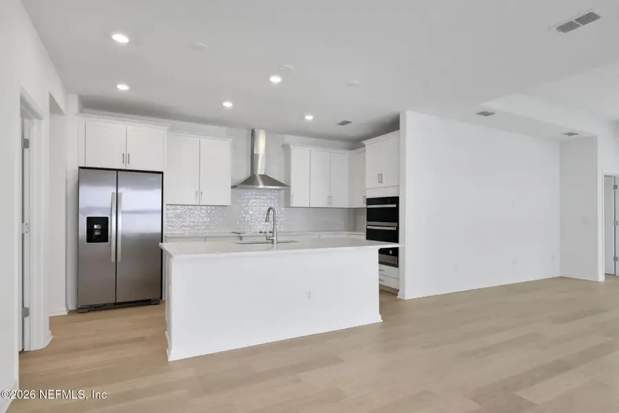Furnished interior view inside a new home in Hyland Trail, Middleburg (Image 5).