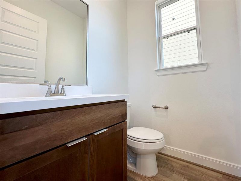 2nd Floor - Powder Bath.*Photos of previous model with similar floor plan.  Finishes will be based on spec for Erin Park community.*