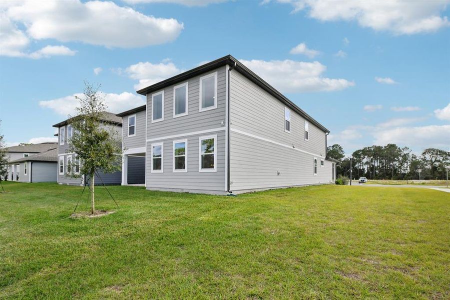 Exterior details and patio area of a home in Northlake Traditional, Winter Garden (Image 28). Exterior details and patio area of a home in Northlake Traditional, Winter Garden (Image 28).