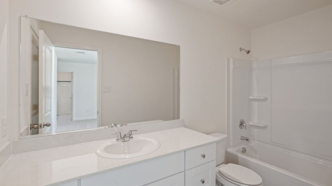 Representative furnished interior of a home built from the Pioneer by Starlight Homes in Sunrise at Arbor Ridge, La Vergne (Image 18).