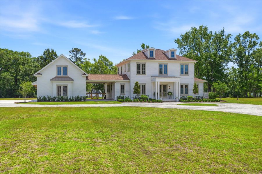 Front exterior of a new home in , Wadmalaw Island, SC, highlighting curb appeal (Image 23).
