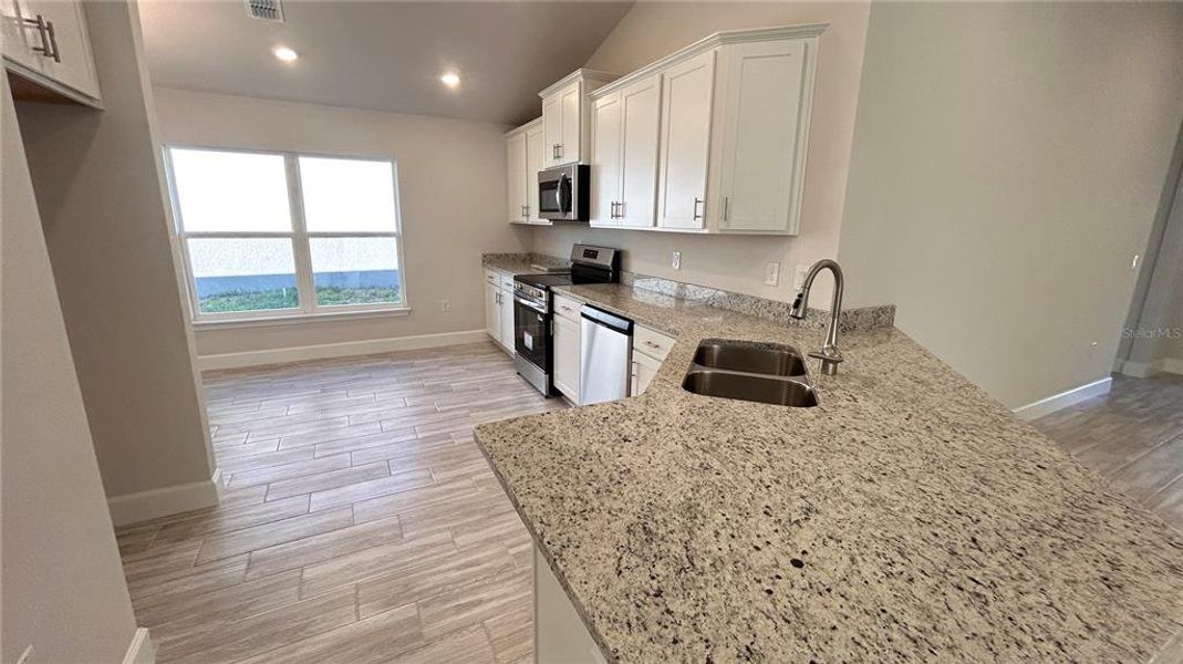 Furnished interior view inside a new home in Abbey Glen, Dade City (Image 7).