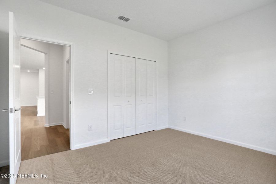 Spacious, unfurnished interior of a new home in Silver Landing at SilverLeaf, St. Augustine (Image 39).