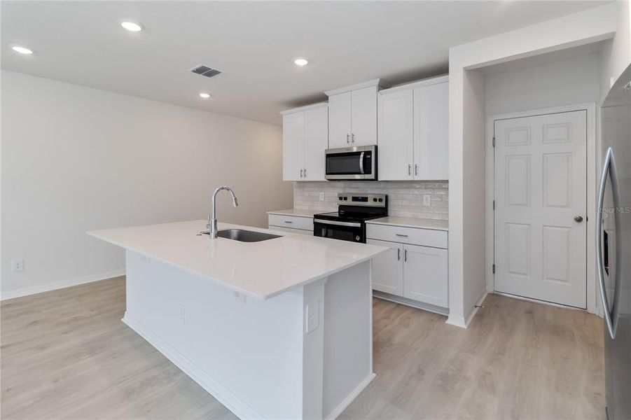 Furnished interior view inside a new home in , St. Cloud (Image 9).