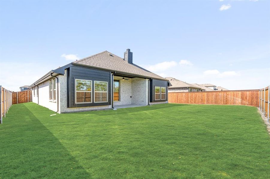 Exterior details and patio area of a home in Waterscape Classic 60s, Royse City (Image 4).