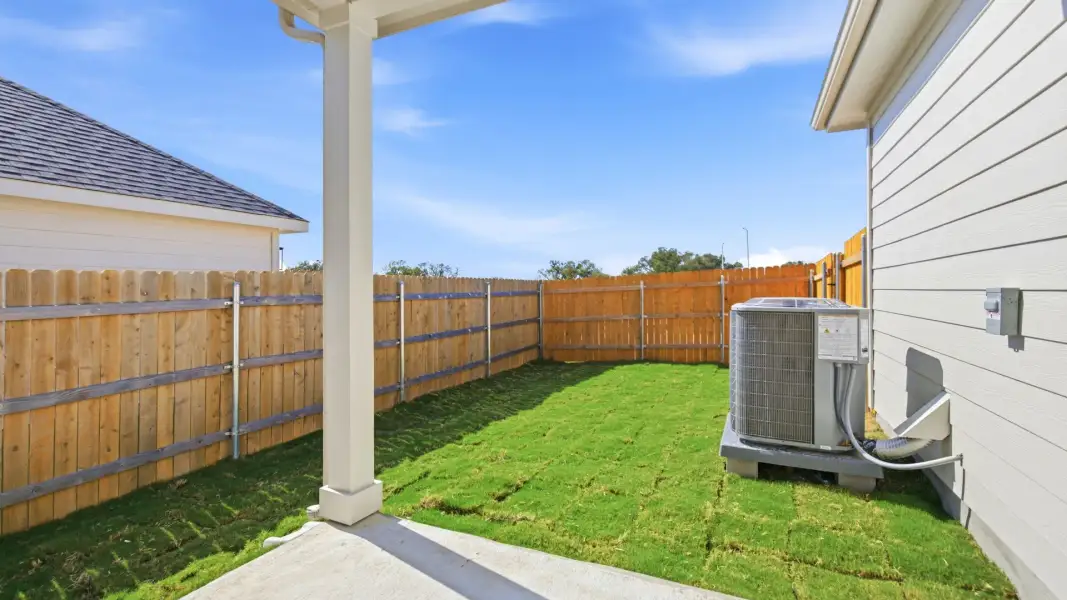 Exterior details and patio area of a home in Creeks Crossing, Elgin (Image 3).