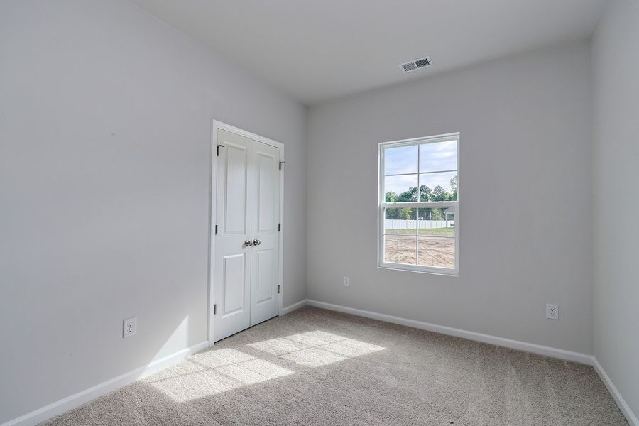 Spacious, unfurnished interior of a new home in Hainer Place, Conway (Image 27).