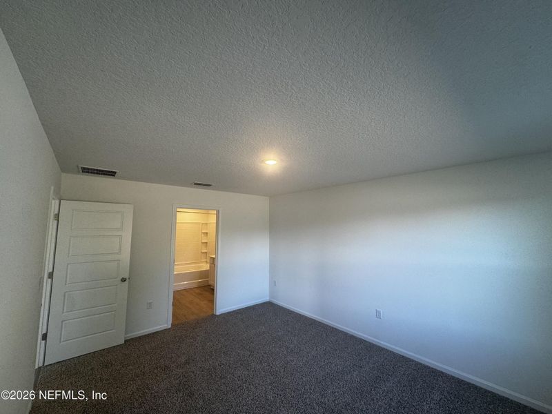 Spacious, unfurnished interior of a new home in The Arbors, Jacksonville (Image 39).