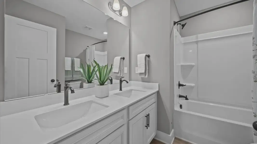 Furnished interior view inside a new home in Clayton Crossing, Arden (Image 13).