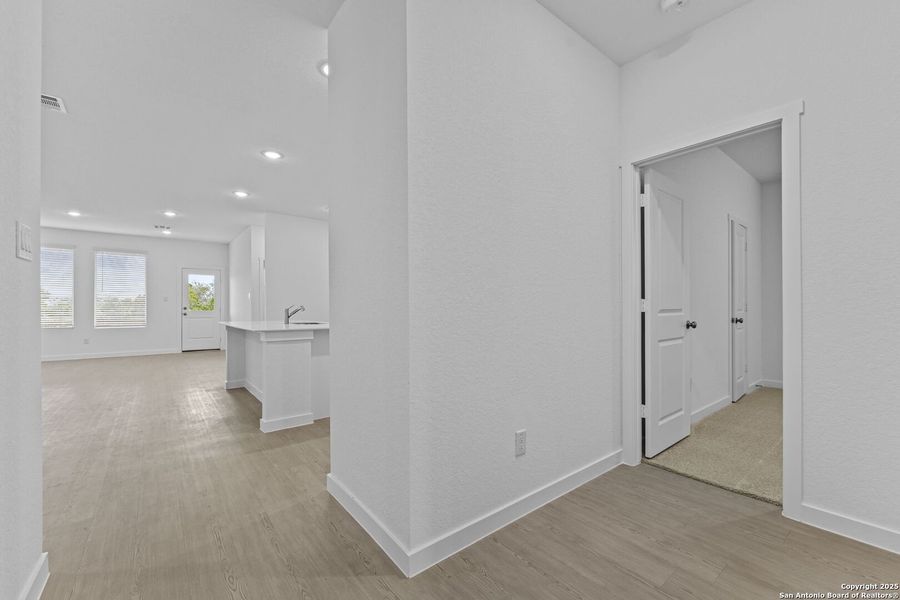 Spacious, unfurnished interior of a new home in Waterwheel: Coastline Collection, San Antonio (Image 29).