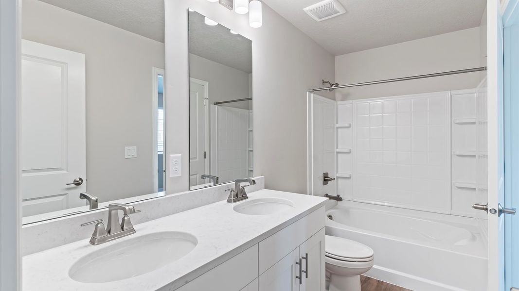 Furnished interior view inside a new home in Green Valley Ranch, Aurora (Image 31).