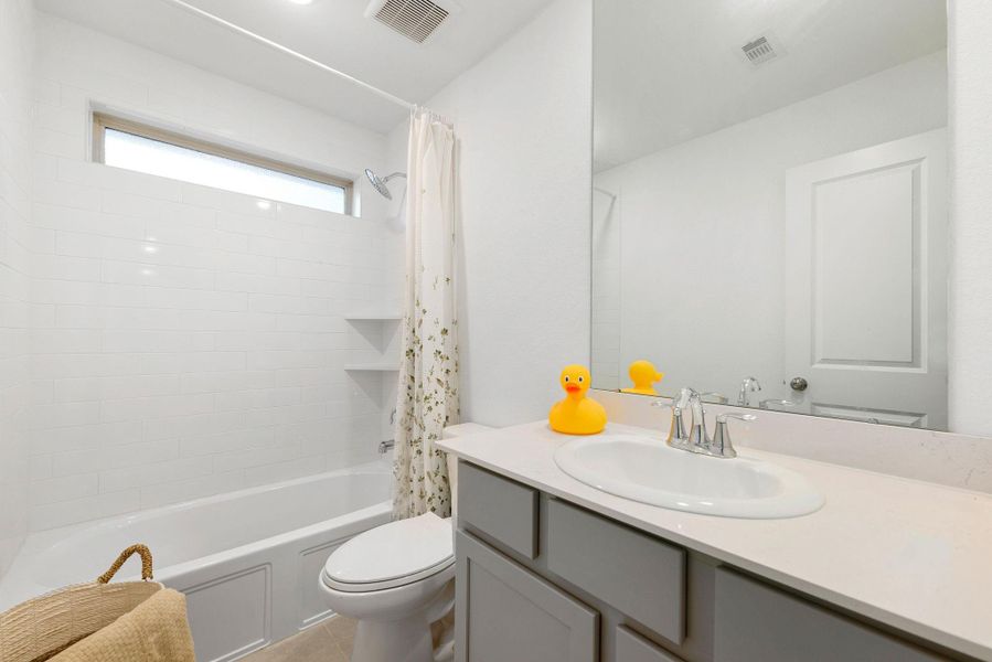 Furnished interior view inside a new home in ARTAVIA: Fairway Collection, Conroe (Image 19).