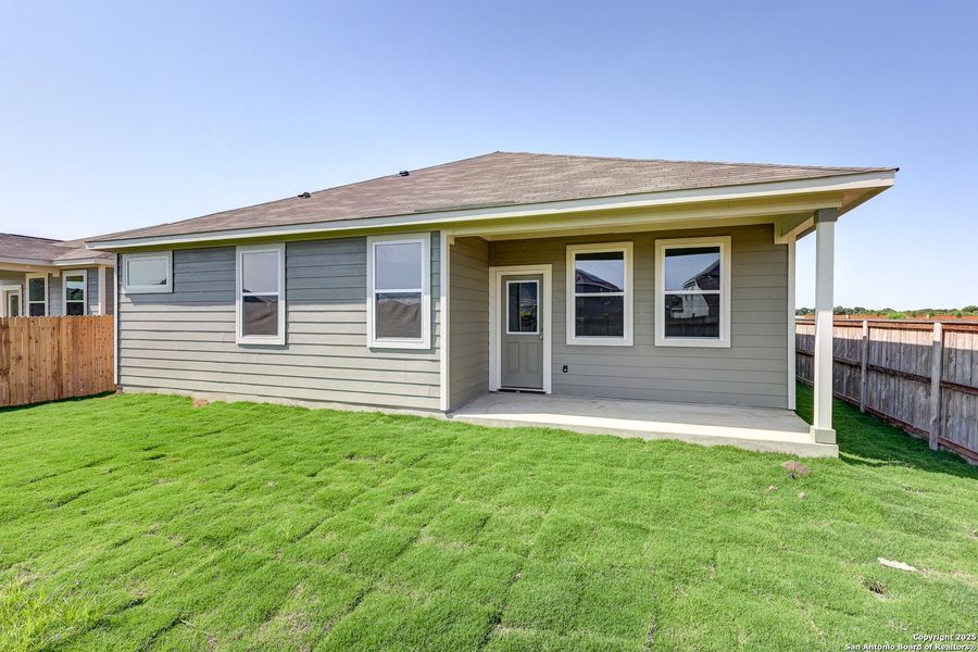 Front exterior of a new home in Cinco Lakes, San Antonio, TX, highlighting curb appeal (Image 19).