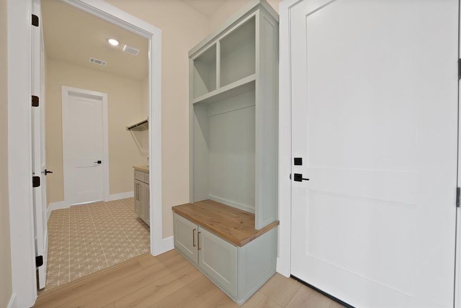 Mudroom featuring light wood-style floors Mudroom featuring light wood-style floors