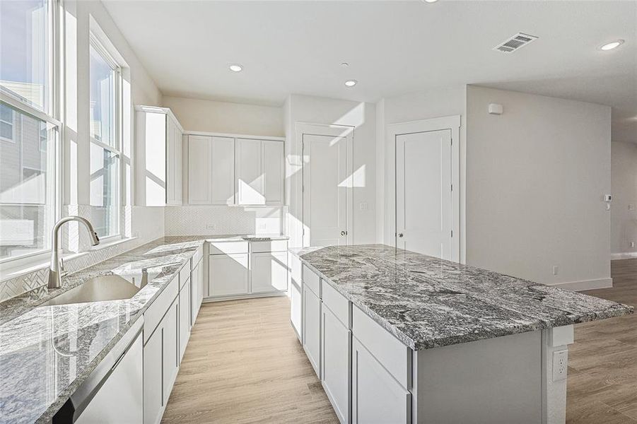 Furnished interior view inside a new home in Collin Creek, Plano (Image 7).
