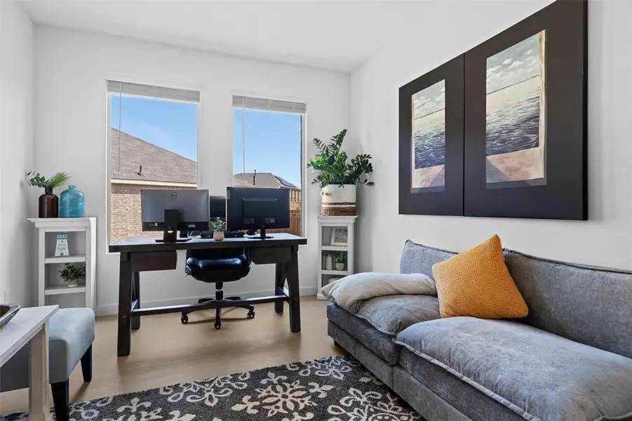 Office area featuring light wood-type flooring and baseboards Office area featuring light wood-type flooring and baseboards