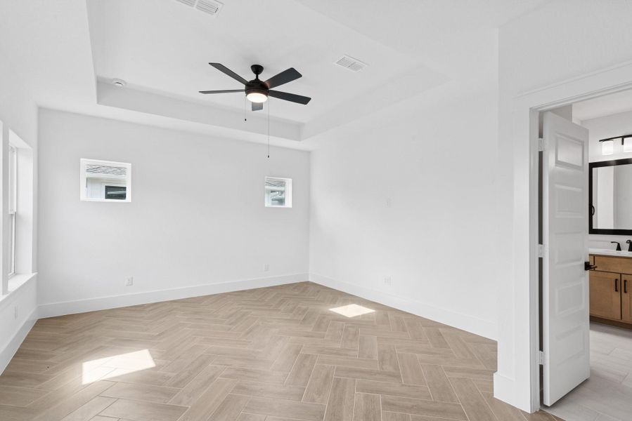 Spacious, unfurnished interior of a new home in Easthaven at Bridgeland Central - Vision Collection, Cypress (Image 29).