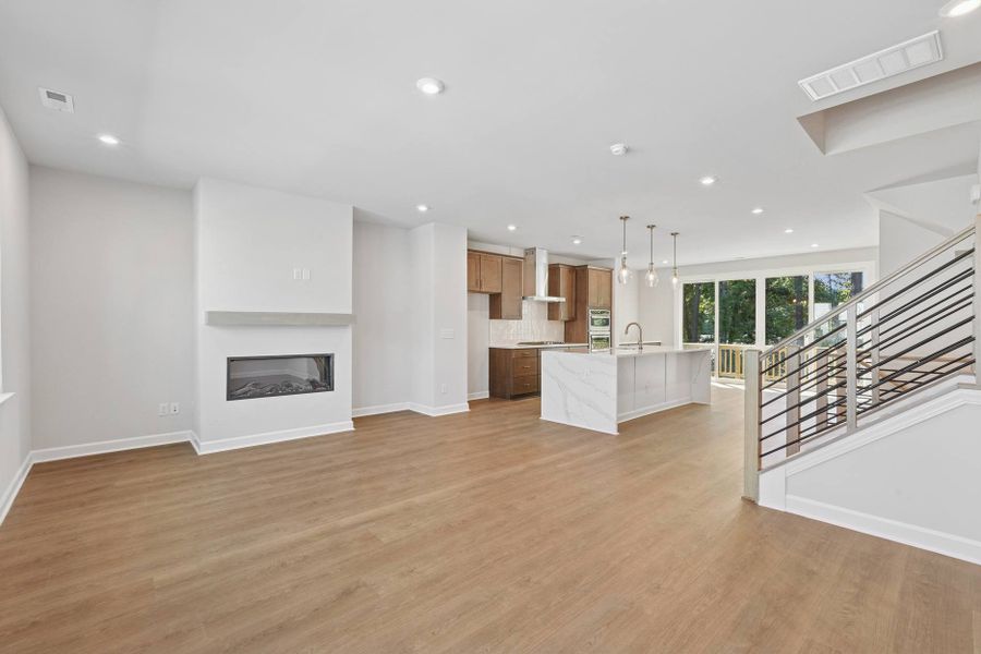 Representative unfurnished interior of a home built from the Kinston by Tri Pointe Homes in Elm Park, Raleigh (Image 11).