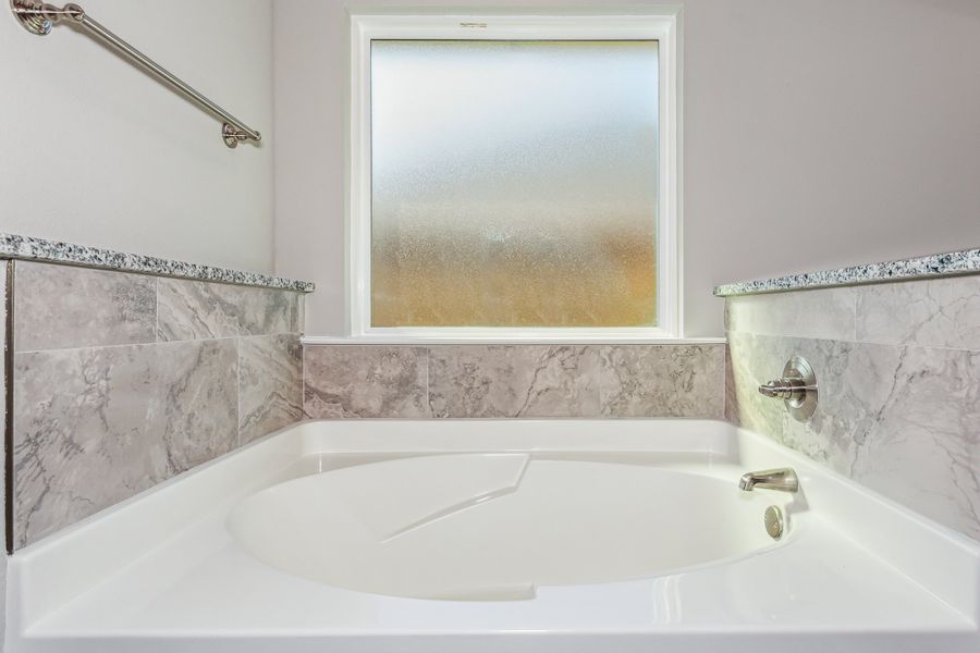 Representative interior finishes for a home built from the The Sapphire by Herbst Homes in Prosperity Point, Milton (Image 21).